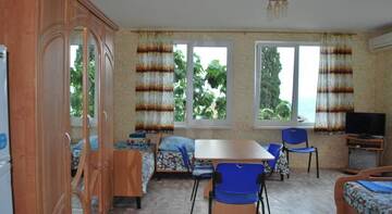 Фото номера Классический четырёхместный номер Гостевой дом Чайка г. Алупка 12