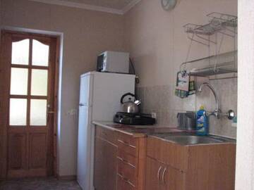 Фото номера Классический четырёхместный номер Гостиница Guest House Natali г. Алупка 2